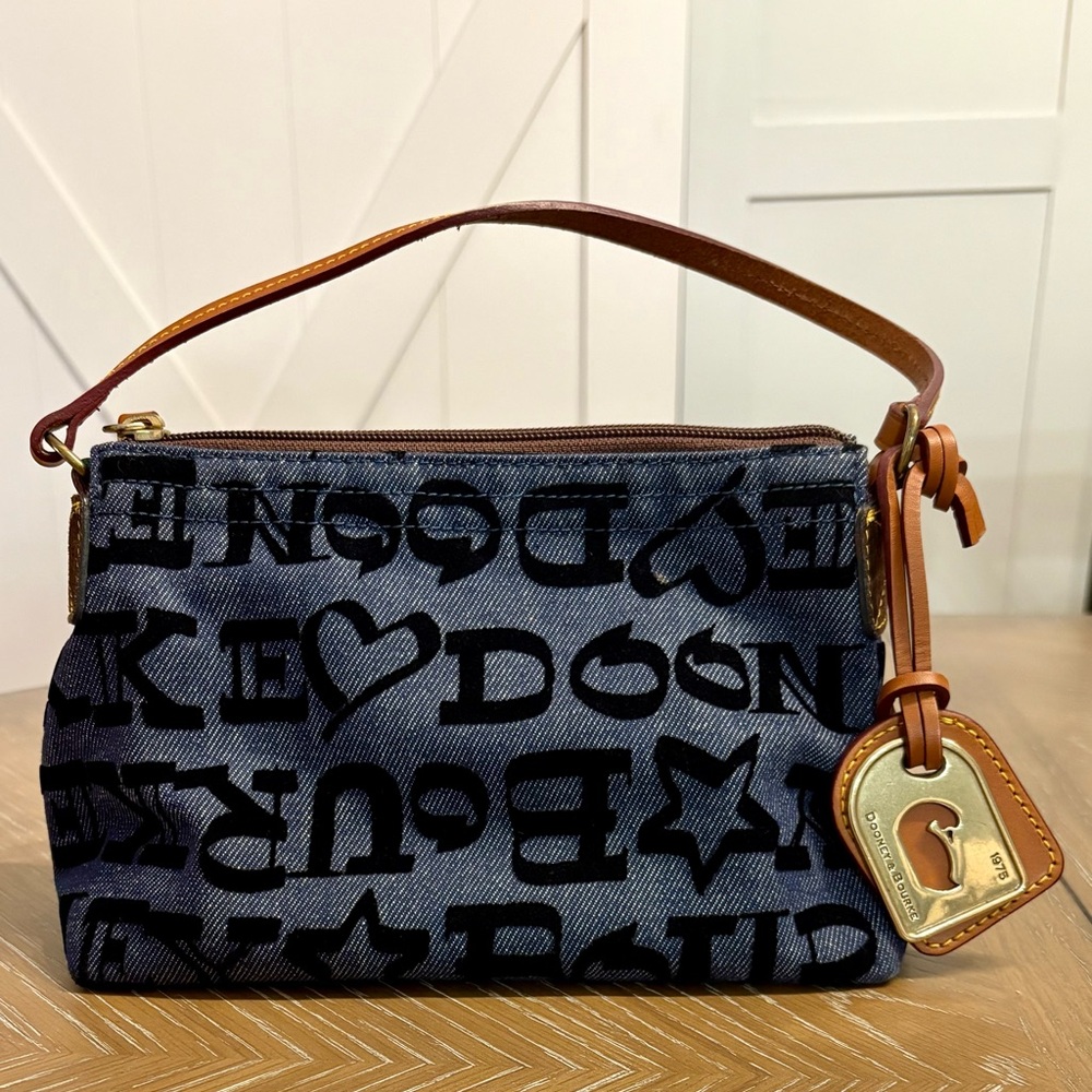Dooney & Bourke denim bag with velvet writing. Used, like new great condition.